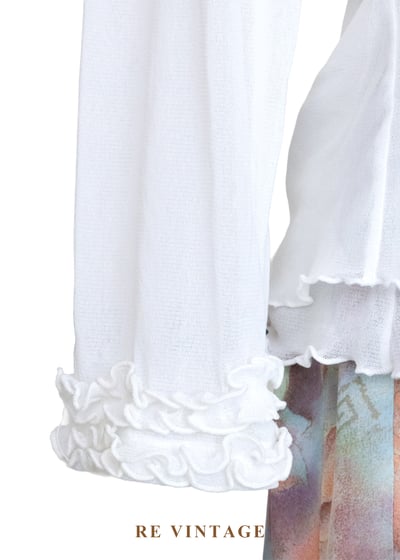 橘光亮片雪白精靈上衣6