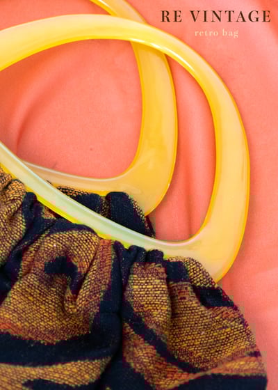 一個黃橘色有個性的復古包9