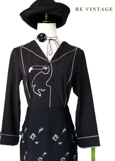 大嘴鳥幾何滾邊白線上衣1