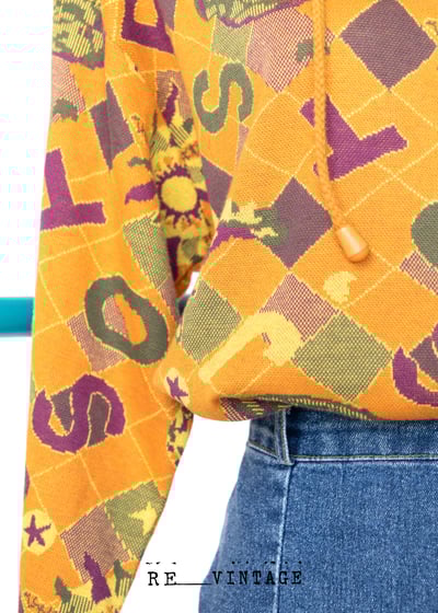 小太陽圖騰針織套頭上衣8