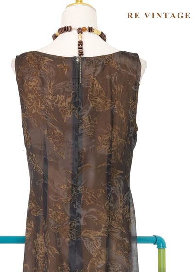 深灰紗中透著橘光抽象花朵長洋裝13