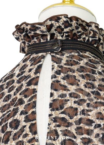 微醺獵豹荷葉削肩背心10