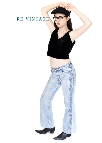 立體小花麻花捲淺色系牛仔褲1