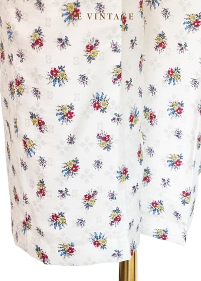 光澤香草奶白色小花高腰九分褲（27-29"）10