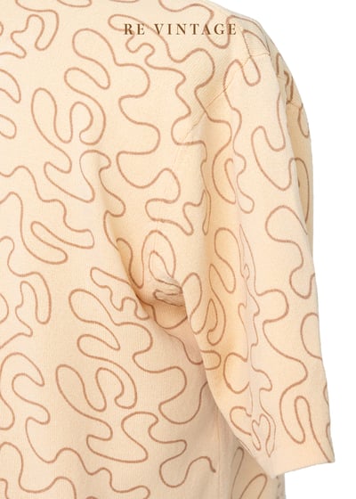 Tender Peach 線條繞繞薄款針織上衣8