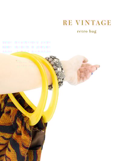 一個黃橘色有個性的復古包2