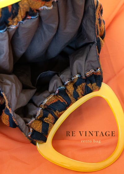 一個黃橘色有個性的復古包7