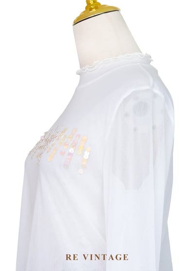 橘光亮片雪白精靈上衣8