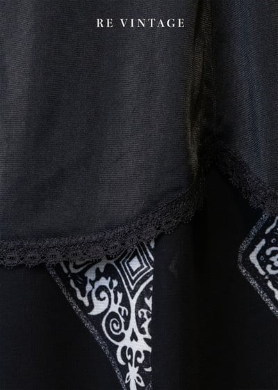 黑系花朵簍空細肩帶小背心6