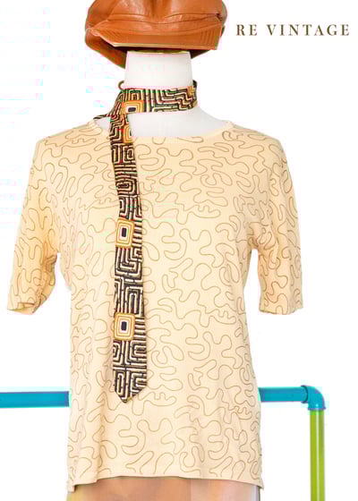 Tender Peach 線條繞繞薄款針織上衣9