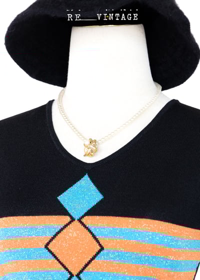 水藍橘子菱格薄款針織上衣3