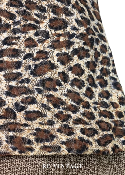 微醺獵豹荷葉削肩背心9