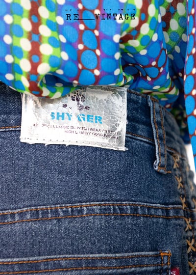 雙色小花刺繡微喇叭牛仔褲5