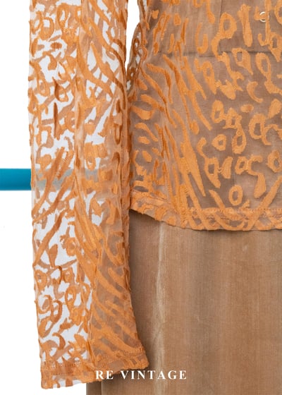 橘子色野性豹紋透膚上衣4