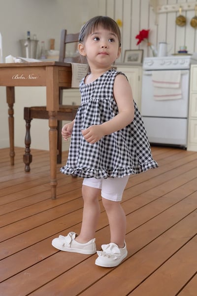 格紋傘擺捲邊上衣(3color)5