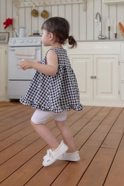 格紋傘擺捲邊上衣(3color)1