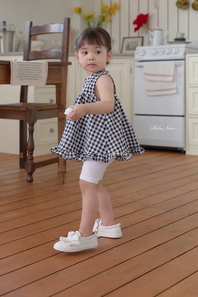 格紋傘擺捲邊上衣(3color)8