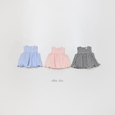 格紋傘擺捲邊上衣(3color)12