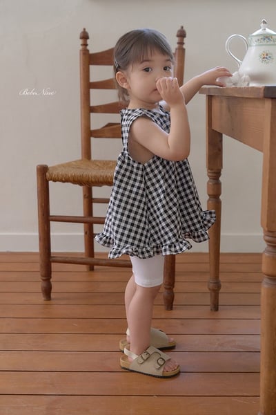 格紋傘擺捲邊上衣(3color)7