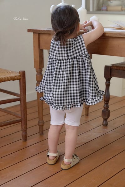 格紋傘擺捲邊上衣(3color)10