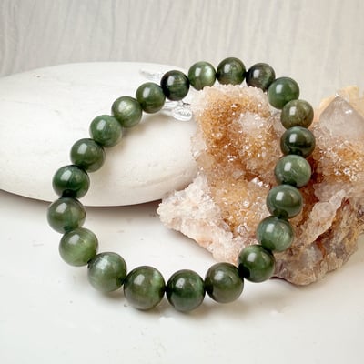 穩定/洞察/事業-《8.5mm特級貓眼綠磷灰石手鍊》2