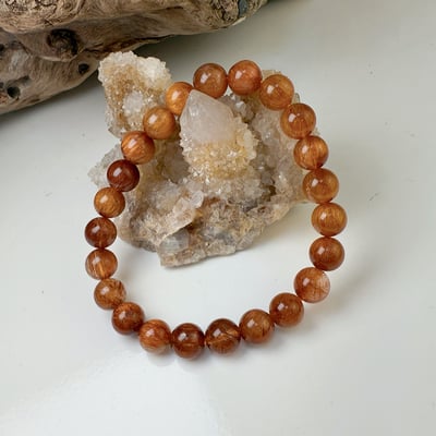 健康/招財-《8mm滿絲透料紅銅鈦手鍊》2