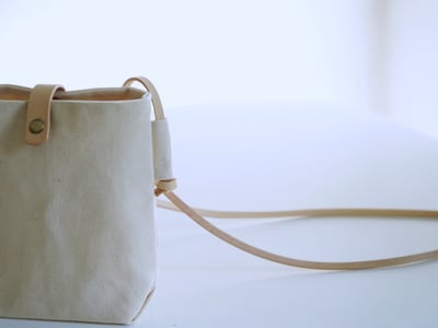 新年福袋 | 簡單斜背蠟包x皮革手環帶 1000元 |11