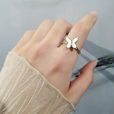 S925銀旋轉花朵蝴蝶戒指2