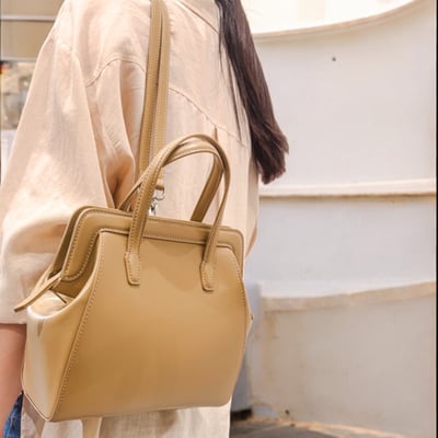 沙影真皮口金後揹包1