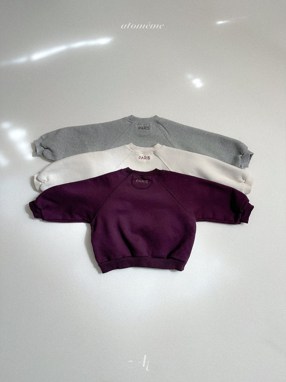 AT38｜(70-110) PARIS 刺繡落肩厚棉休閒上衣