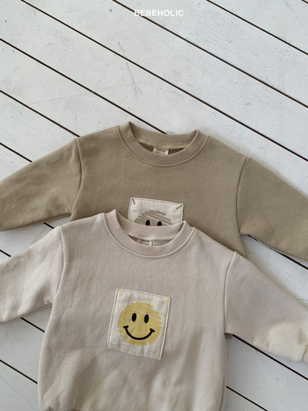 Bebe holic59｜(3m-18m) 微笑印花包屁衣