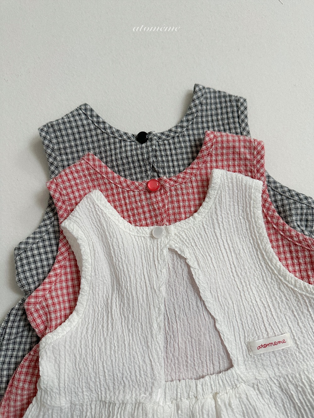 Atomeme32｜(70-110) 格紋設計傘狀上衣
