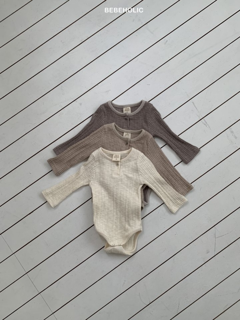 Bebe holic30｜(3m-18m) 鈕扣坑條包屁衣