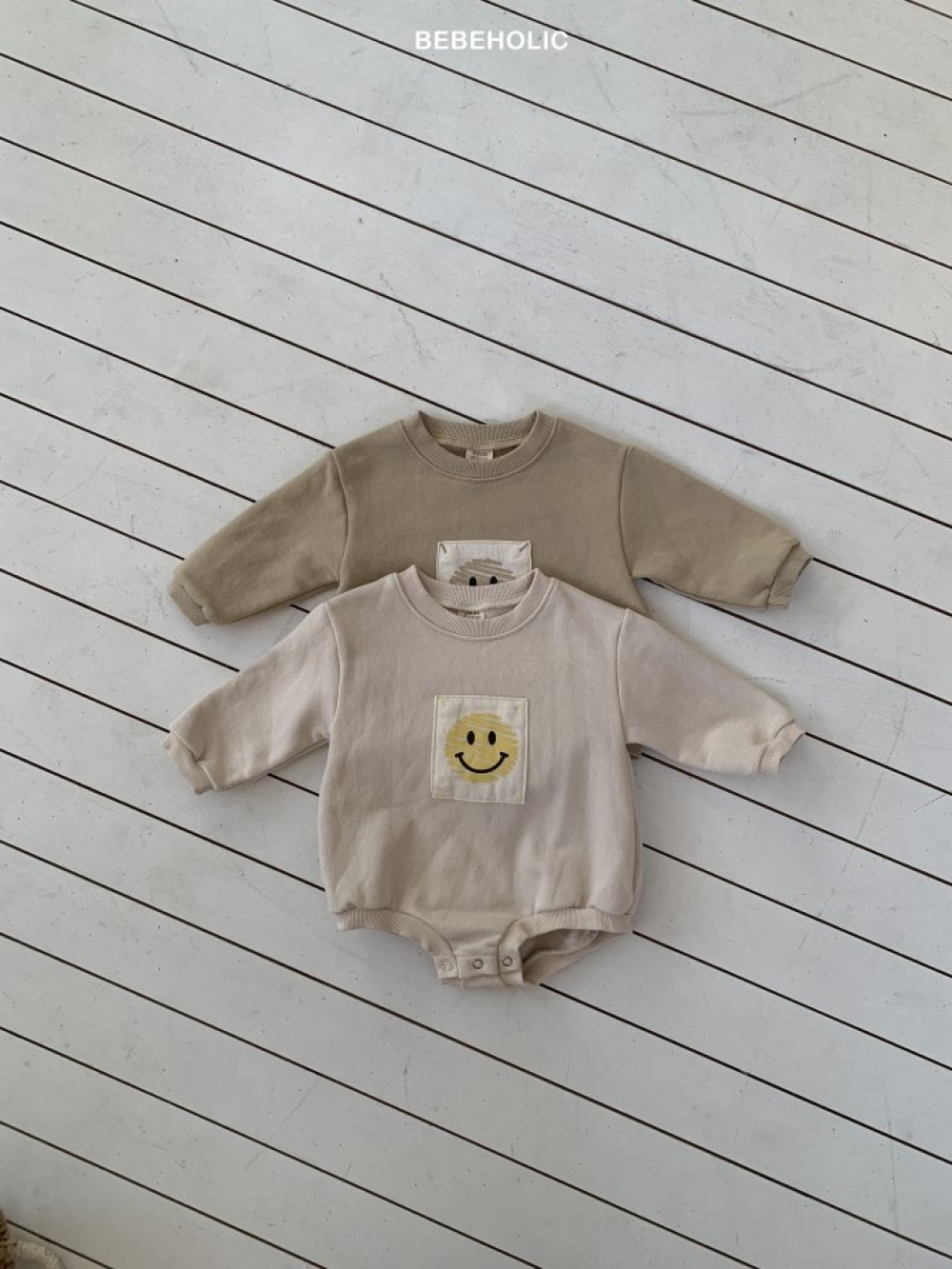 Bebe holic59｜(3m-18m) 微笑印花包屁衣
