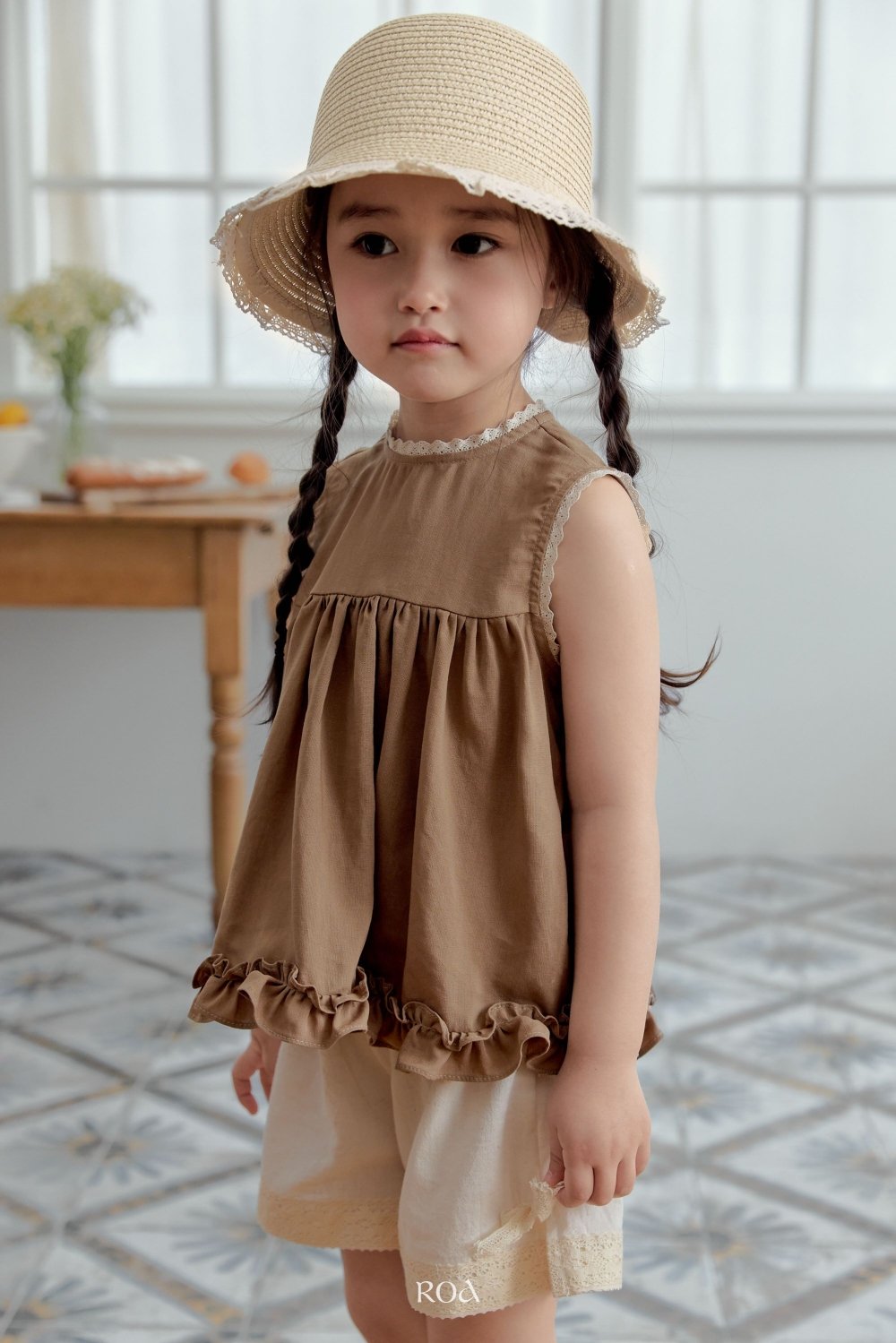 ROA18｜(6m-18m) 2色蕾絲滾邊荷葉擺背心