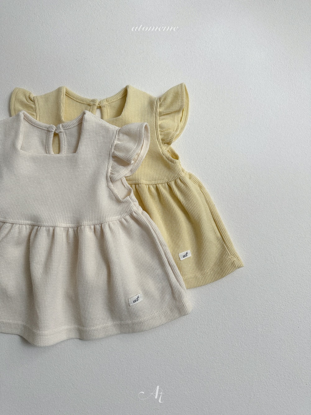 Atomeme22｜(70-110) 華夫格荷葉袖傘狀上衣