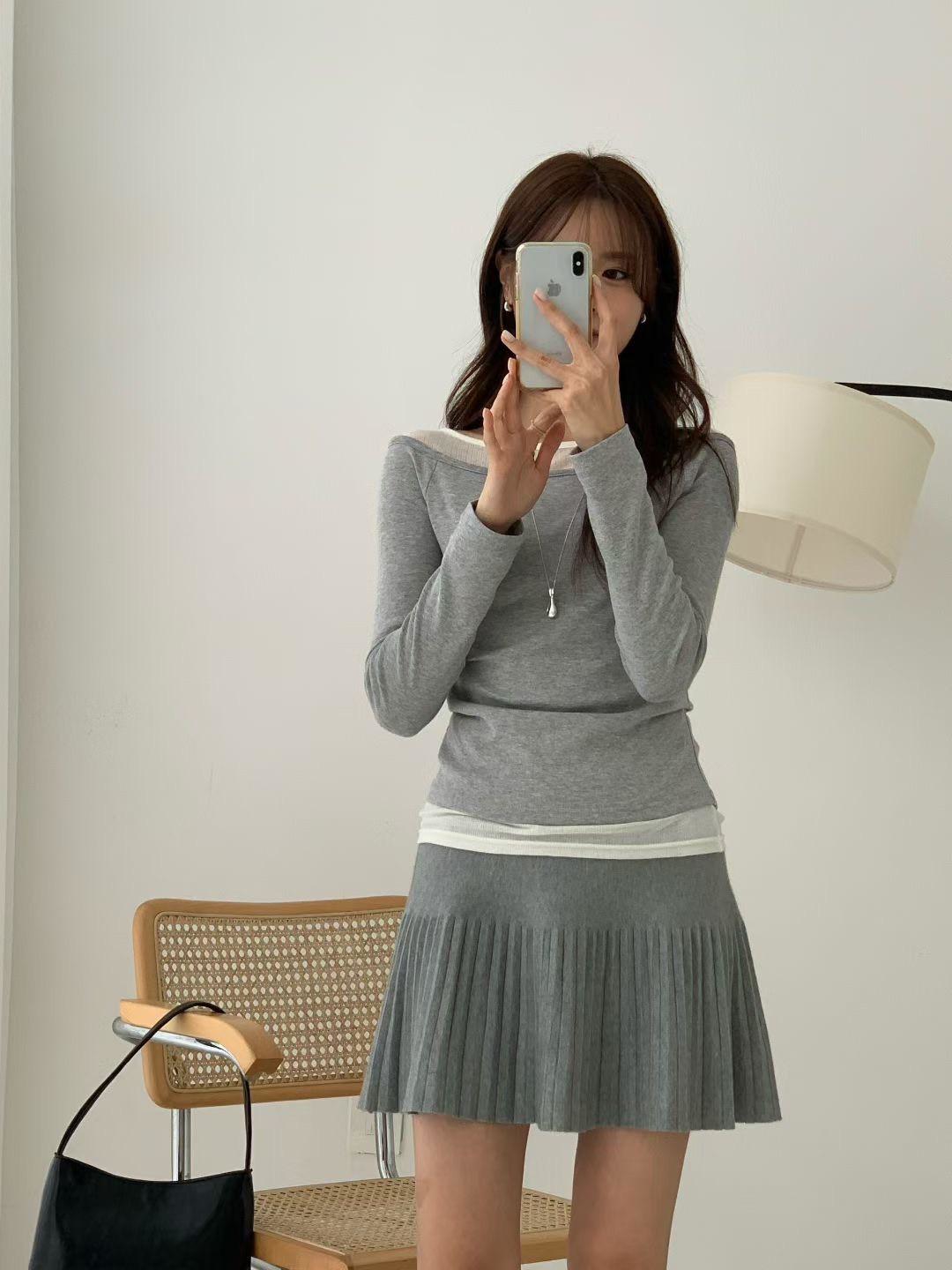 假兩件拼接造型上衣