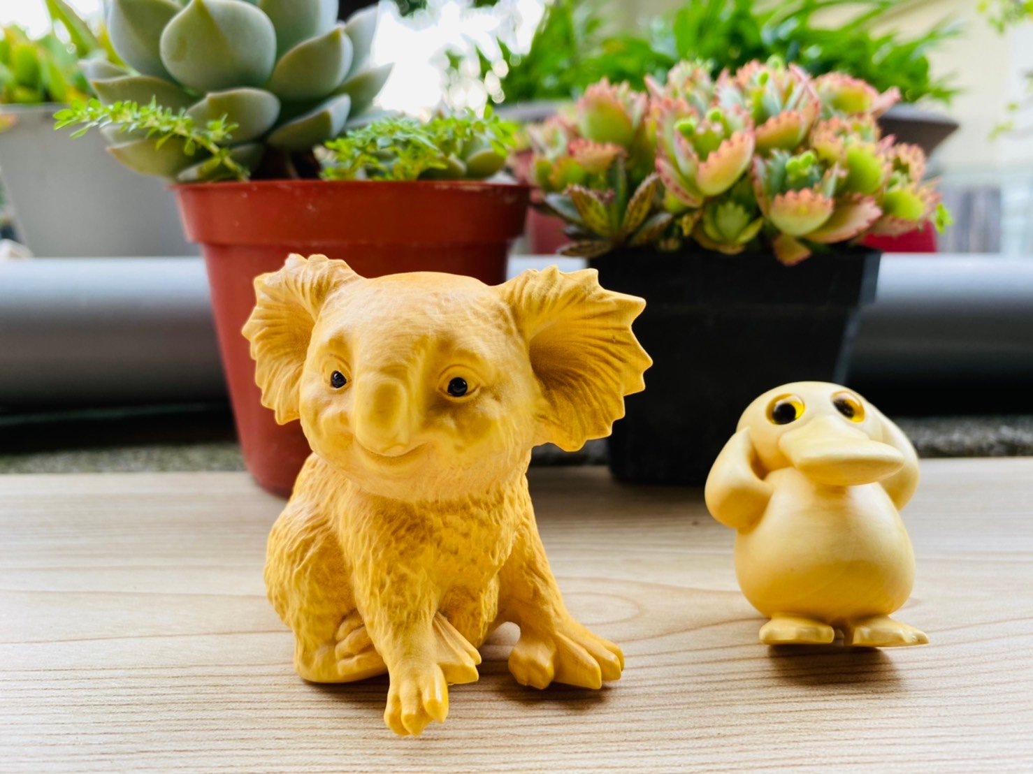 黃楊木精雕擺件【可達鴨與考拉套組】