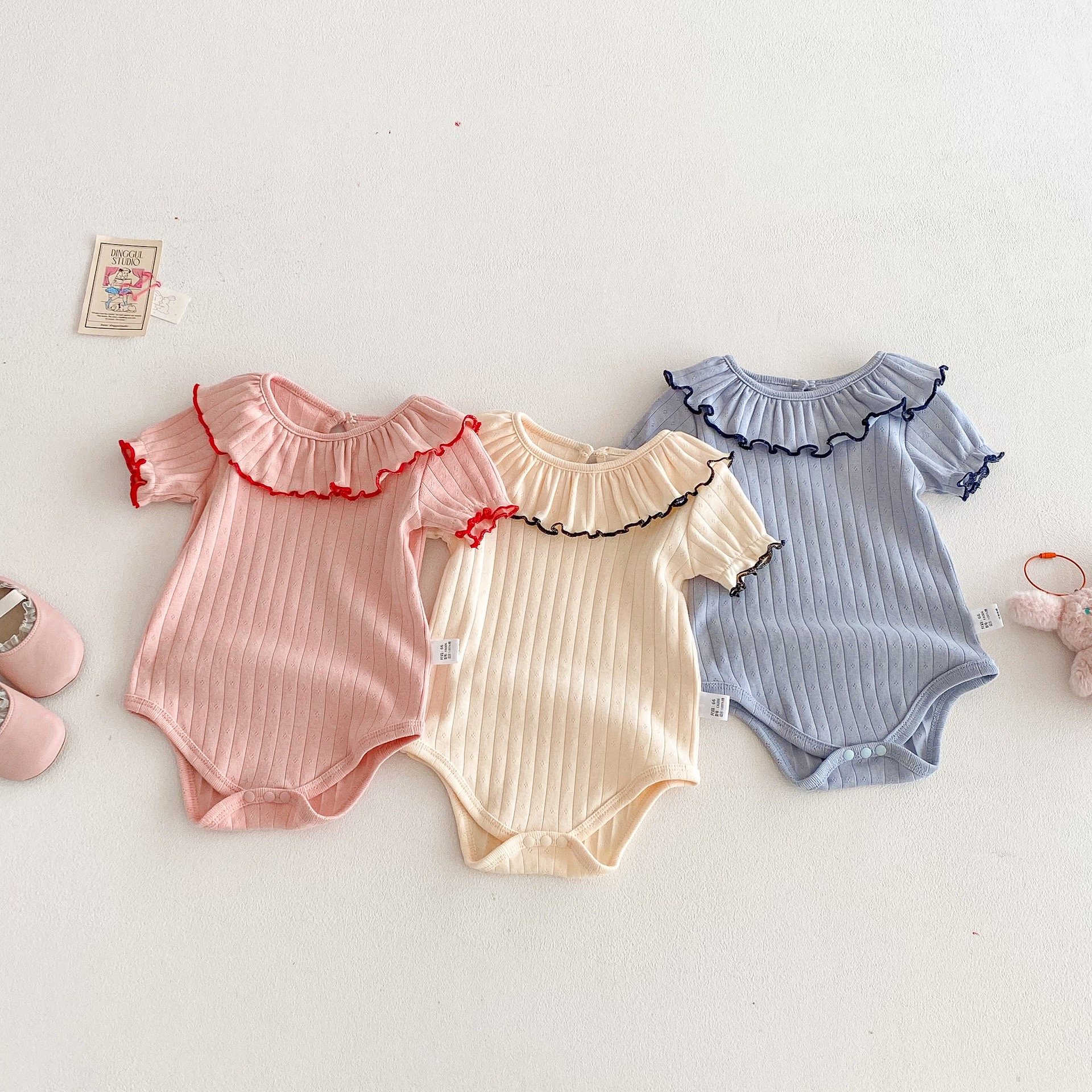 大片花領坑條包屁衣