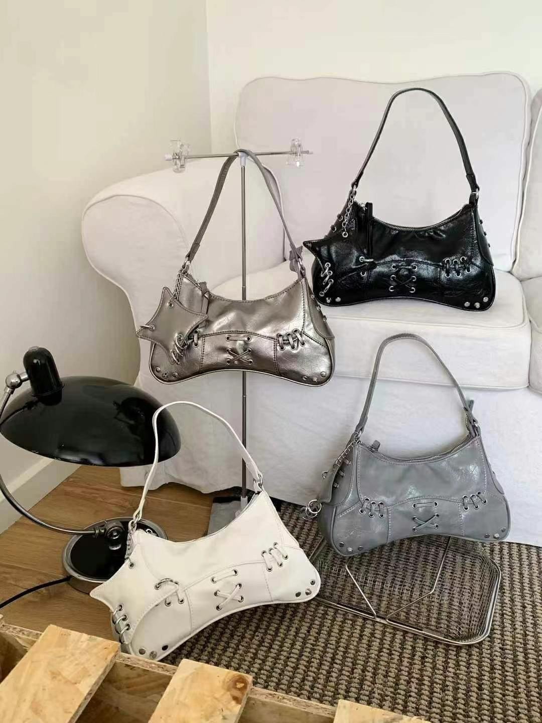 韓國TRO 美式復古卯釘機車手提斜挎包