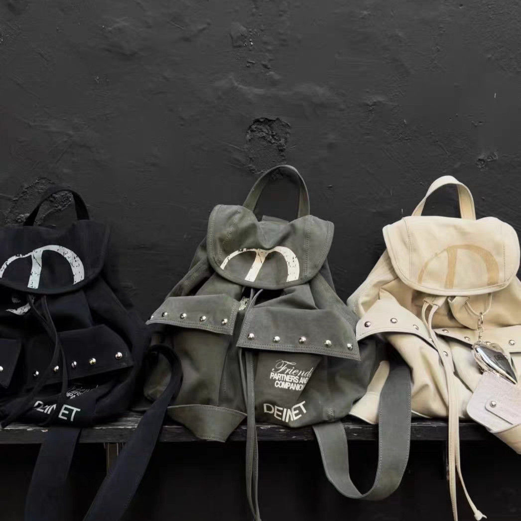 韓系百搭大容量後背包 手感帆布鉚釘原創設計抽繩包