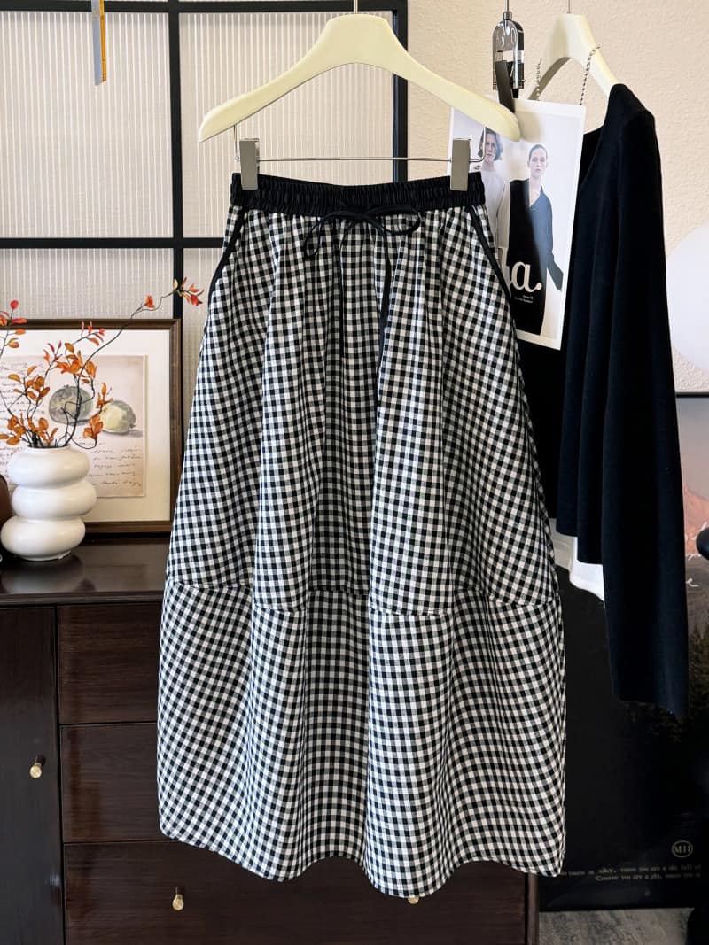 輕熟鹽系格子花苞裙