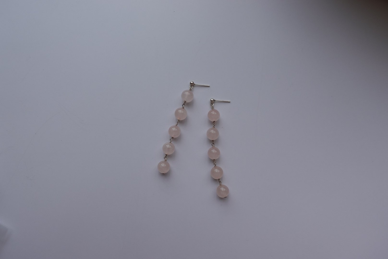 連續垂墜粉水晶耳環 S925