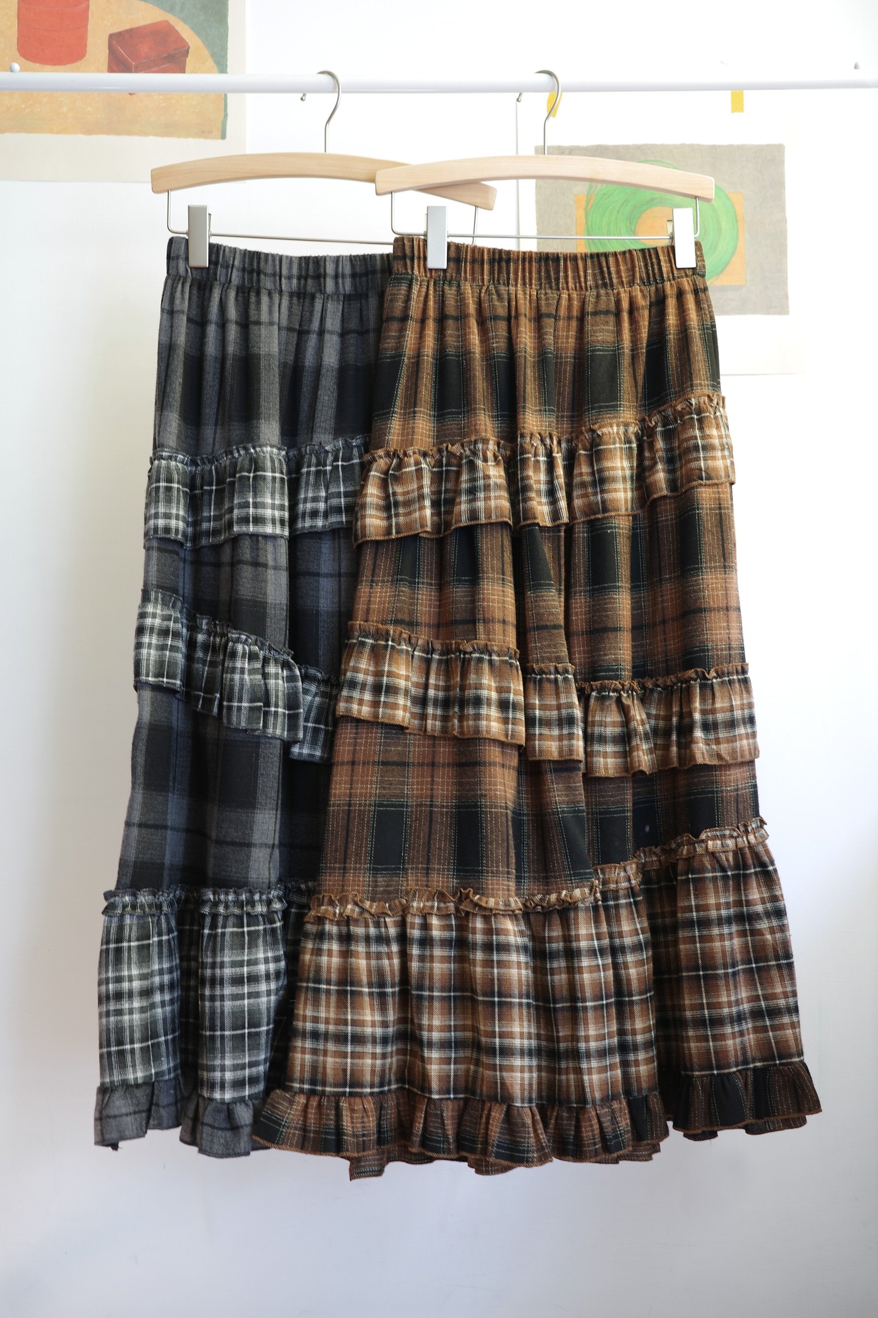 𓏭層次堆疊法蘭絨格紋裙