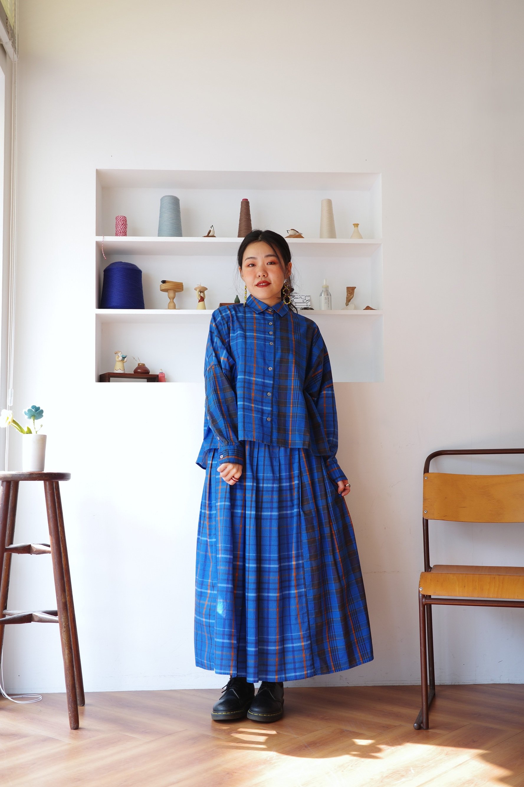 𓏭跳色格紋壓摺半身裙