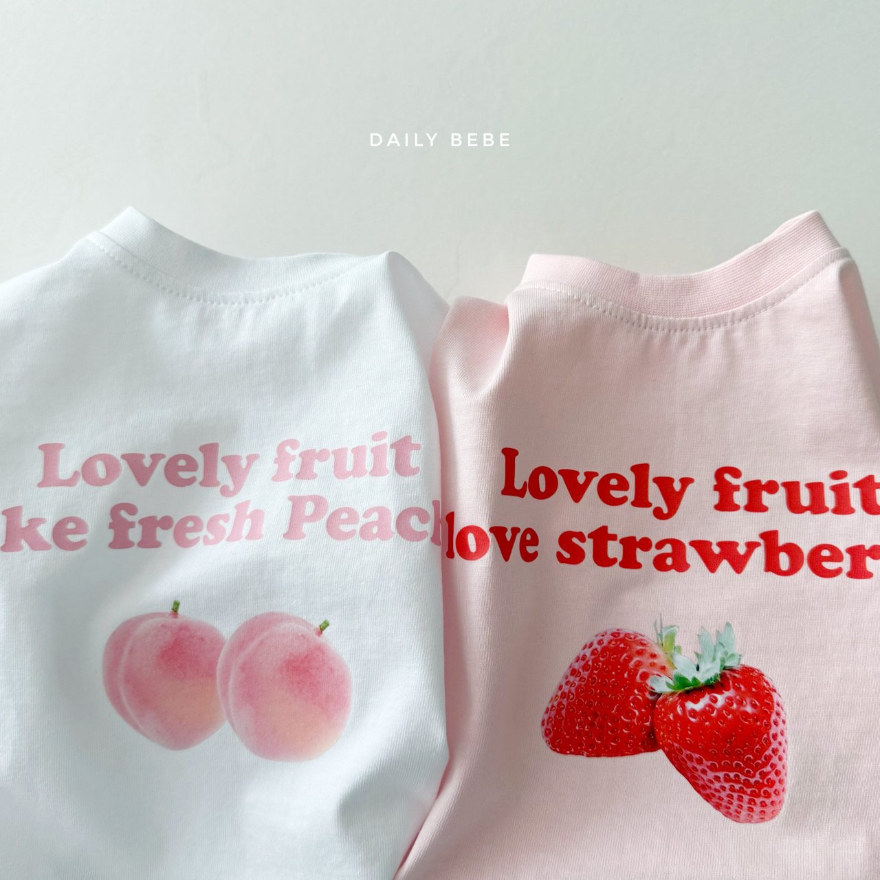 042512水蜜桃草莓上衣(兩色)