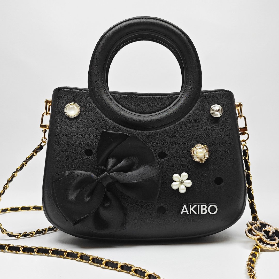 【買1送1】AKIBO滿月包-經典黑/皮革花漾背帶(肩背手提洞洞包。中性款、輕量、防水) / 內附AKIBO品牌鞋扣1個。現在買再送鞋扣組(不挑款)