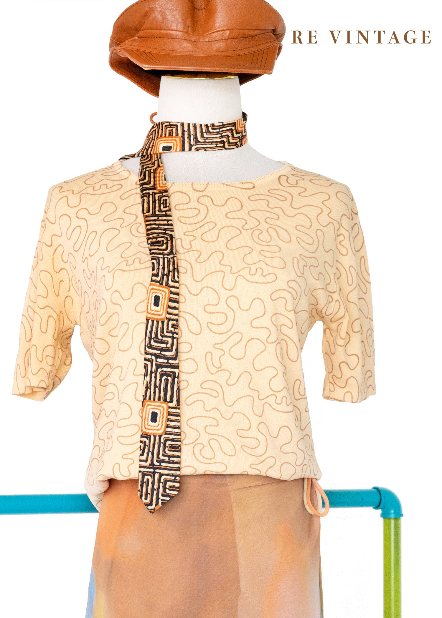 Tender Peach 線條繞繞薄款針織上衣