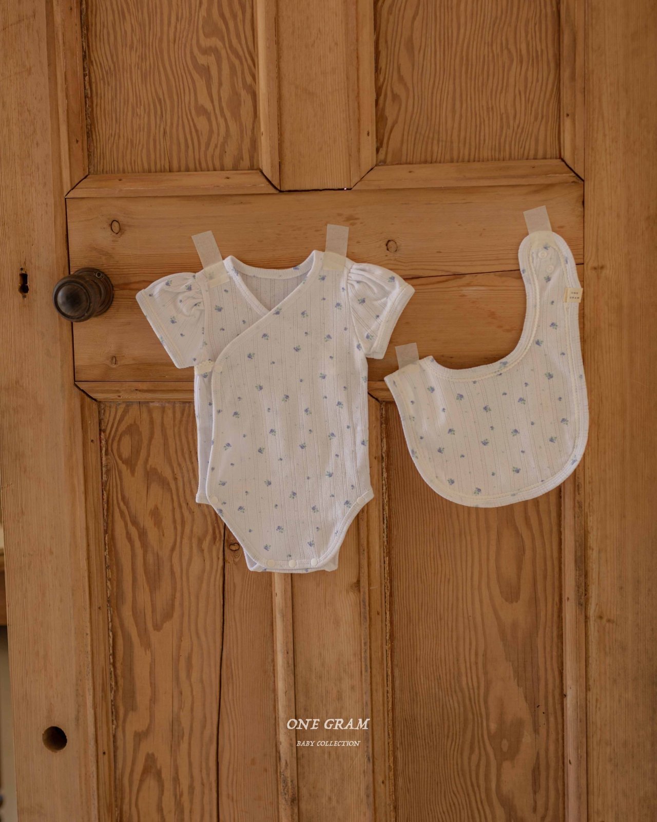 蕾絲滾邊澎袖小花側開扣包屁衣*現貨6m