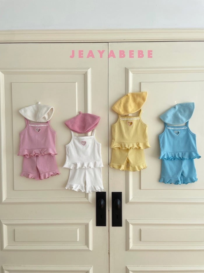 鏤空愛心木耳捲邊背心套裝